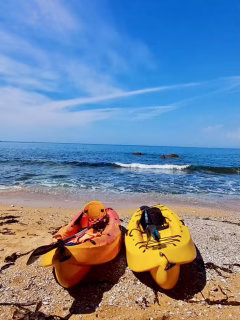 Two kayaks on the beach - hypnotherapy for relationships in Weston-super-Mare